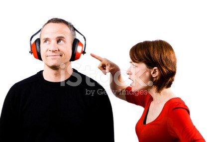 9044385-woman-yelling-at-man-wearing-ear-protection